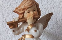 Ange photophore avec flûte traversière