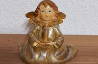 Ange or-argent avec bougie