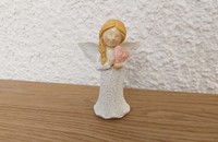 Ange gardien coeur sur le coeur