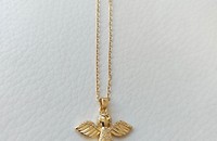 Collier avec pendentif ange couleur or
